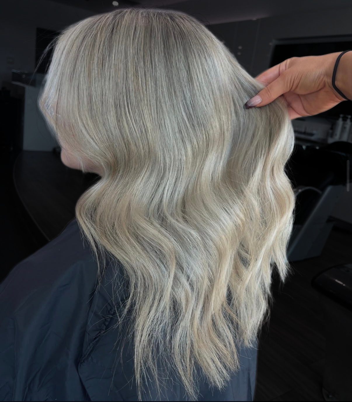 Cool blonde blow-wave finished with a smooth blowdry